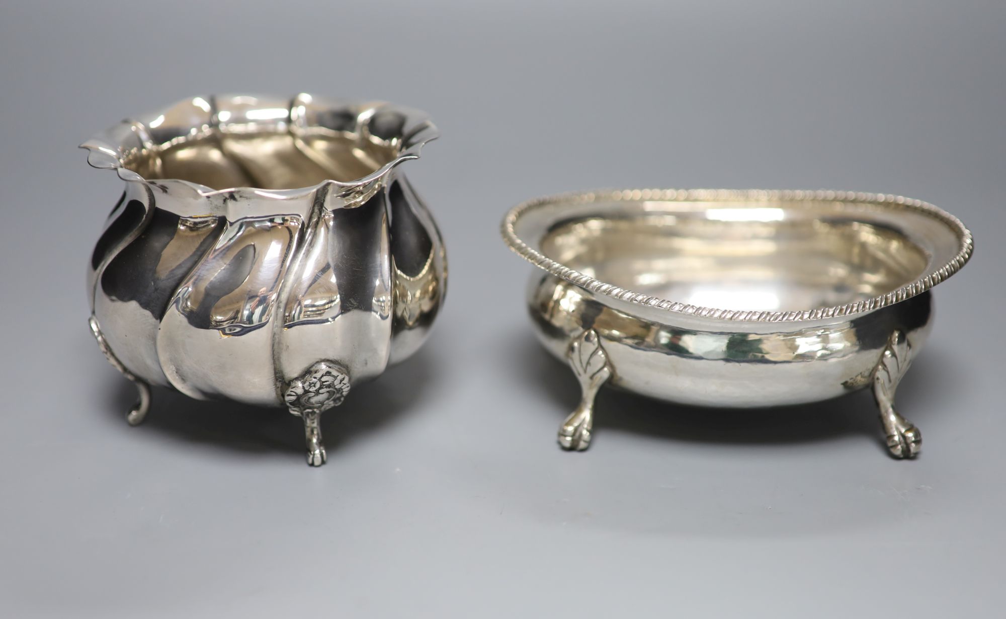 An Italian 800 standard silver oval sugar bowl and a similar circular fluted lobed bowl, 14.4oz